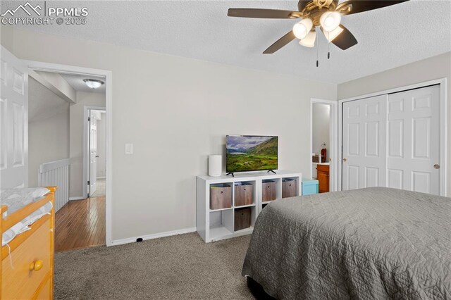 537 Blossom Field Rd, Fountain, CO 80817 - bedroom featuring a textured ceiling, a closet, ceiling fan, carpet, and baseboards