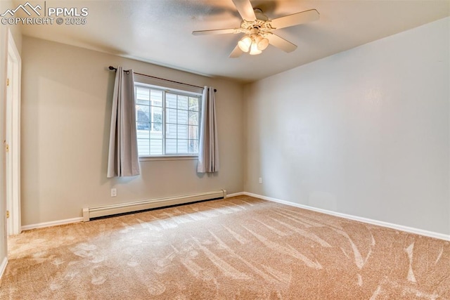 empty room featuring a baseboard heating unit, ceiling fan, baseboards, and carpet flooring