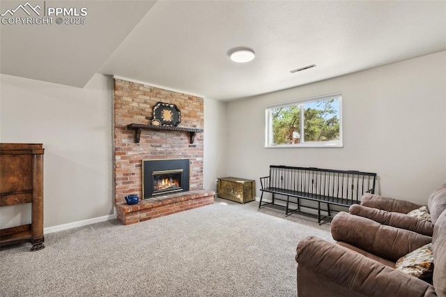 carpeted living room featuring visible vents, a fireplace, and baseboards