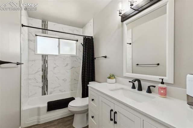 full bath with vanity, toilet, and shower / bath combination with curtain