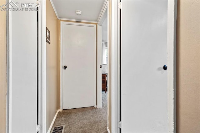 corridor featuring visible vents and carpet