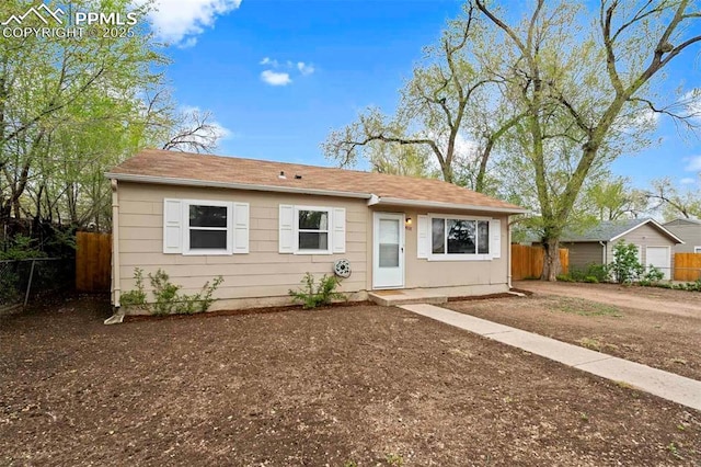 view of front of property with fence