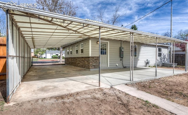2204 Bonfoy Ave, Colorado Springs, CO 80909 - view of parking / parking lot with an attached carport