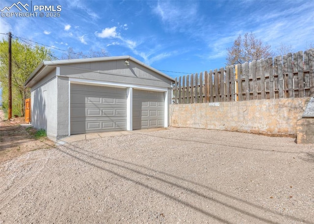 2204 Bonfoy Ave, Colorado Springs, CO 80909 - detached garage featuring fence