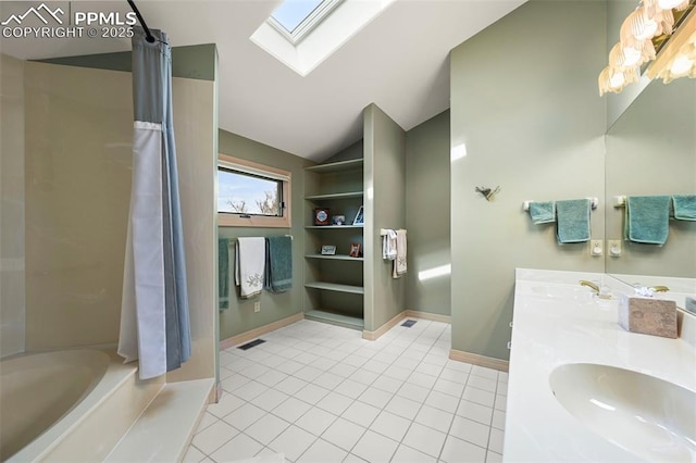 full bath with a sink, shower / bath combination with curtain, lofted ceiling with skylight, visible vents, and tile patterned flooring