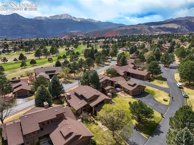 drone / aerial view with a mountain view and a residential view