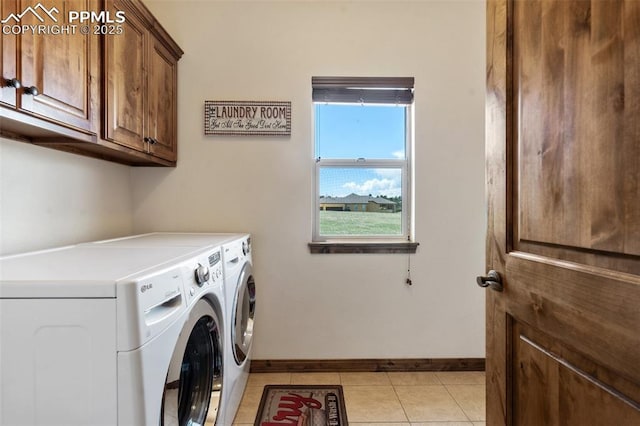 4908 Silver Nell Dr, Colorado Springs, CO 80908 - washroom featuring cabinet space, independent washer and dryer, baseboards, and light tile patterned floors