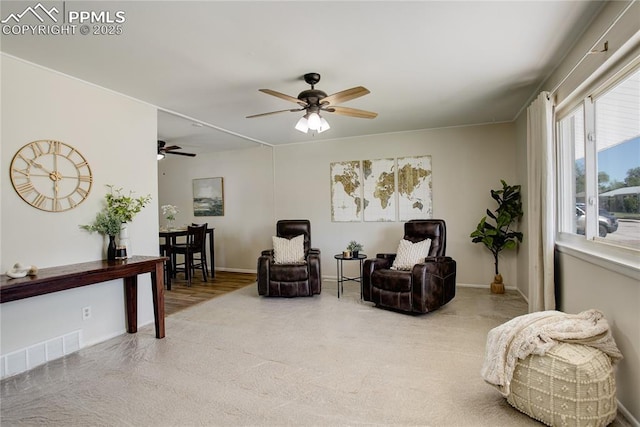 409 Columbine St, Fountain, CO 80817 - living area featuring a ceiling fan, baseboards, and carpet flooring