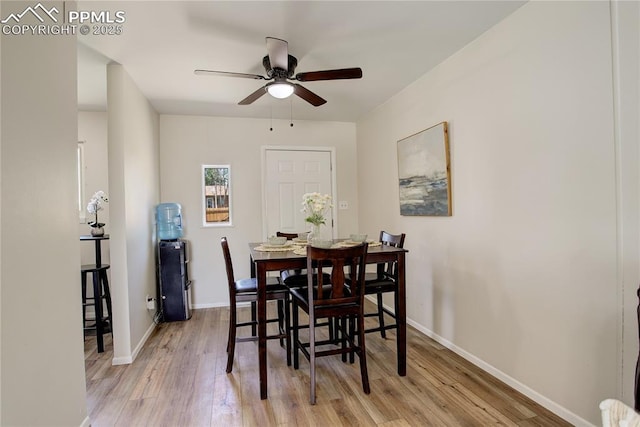 409 Columbine St, Fountain, CO 80817 - dining room with light wood-type flooring, a ceiling fan, and baseboards
