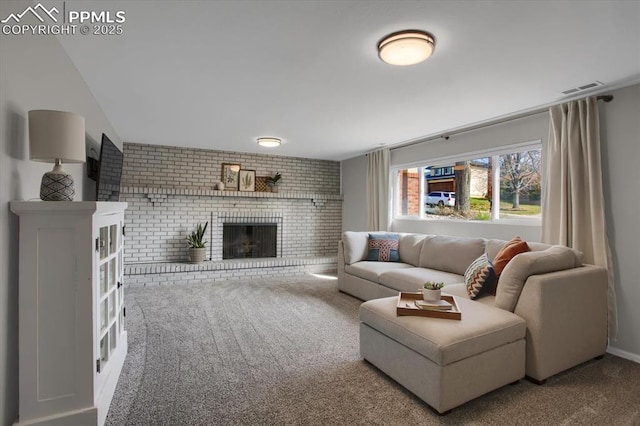 5064 Artistic Cir, Colorado Springs, CO 80917 - carpeted living room with visible vents, brick wall, and a fireplace