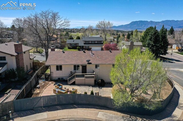 5064 Artistic Cir, Colorado Springs, CO 80917 - drone / aerial view featuring a residential view and a mountain view