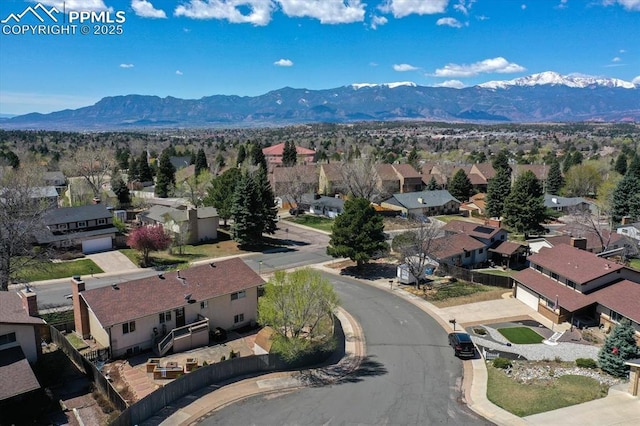 5064 Artistic Cir, Colorado Springs, CO 80917 - drone / aerial view with a residential view and a mountain view