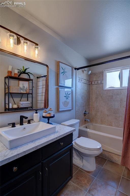 bathroom with vanity, toilet, tile patterned flooring, and shower / tub combo with curtain