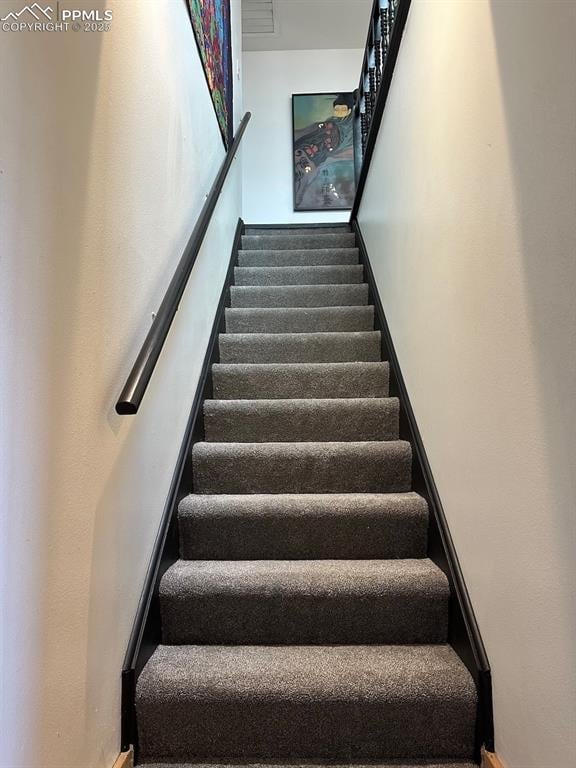 staircase with baseboards