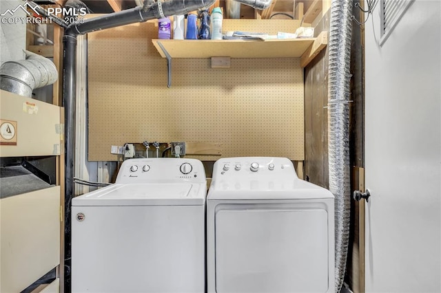 4230 Hollow Rd, Colorado Springs, CO 80917 - clothes washing area featuring separate washer and dryer and laundry area