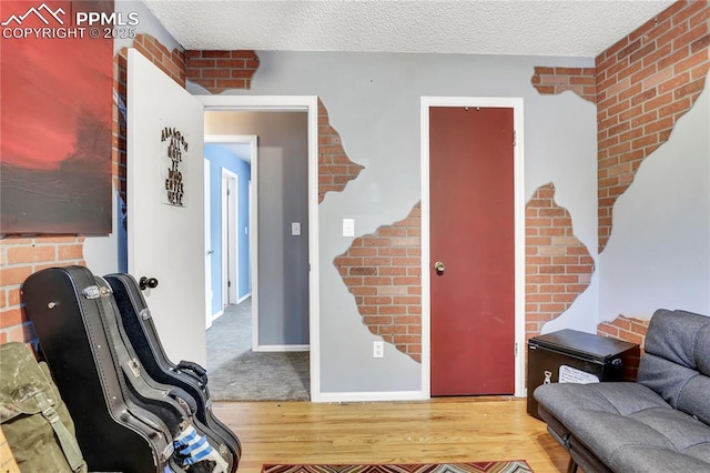 4230 Hollow Rd, Colorado Springs, CO 80917 - interior space with baseboards, a textured ceiling, and wood finished floors
