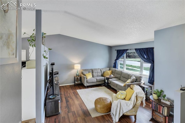 4230 Hollow Rd, Colorado Springs, CO 80917 - living area with a textured ceiling and wood finished floors