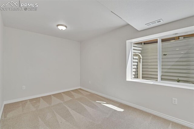 16850 Buffalo Valley Path, Monument, CO 81032 - unfurnished room featuring carpet flooring, visible vents, and baseboards