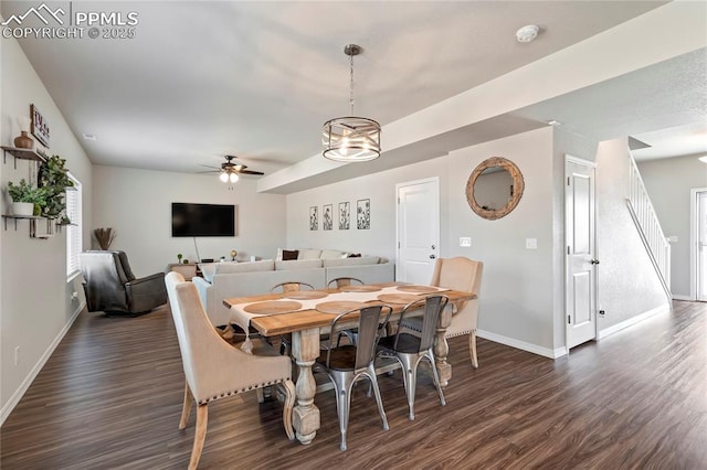 dining room featuring baseboards, dark wood-style floors, and ceiling fan