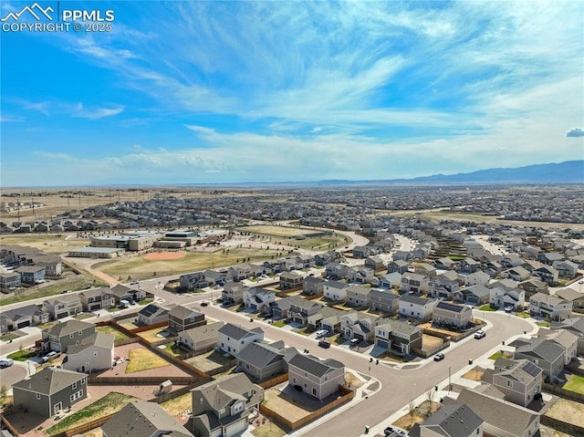 bird's eye view with a mountain view and a residential view
