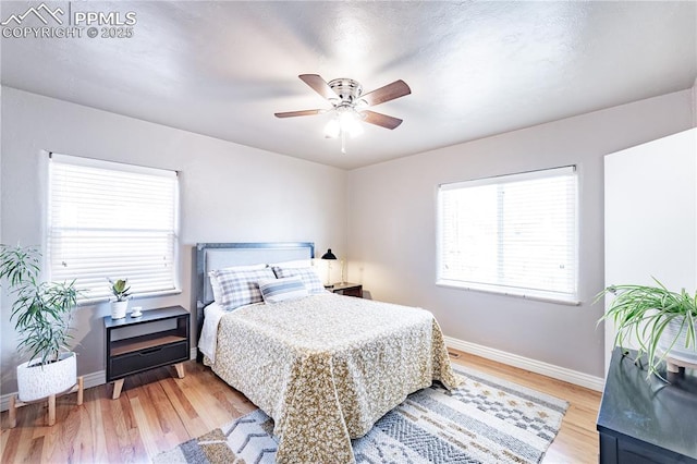 413 E Fontanero St, Colorado Springs, CO 80907 - bedroom with baseboards, a ceiling fan, and light wood-style flooring