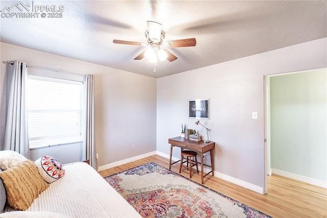 413 E Fontanero St, Colorado Springs, CO 80907 - bedroom featuring baseboards, a ceiling fan, and wood finished floors
