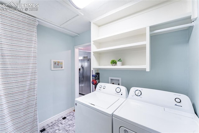 413 E Fontanero St, Colorado Springs, CO 80907 - clothes washing area with baseboards, laundry area, and independent washer and dryer