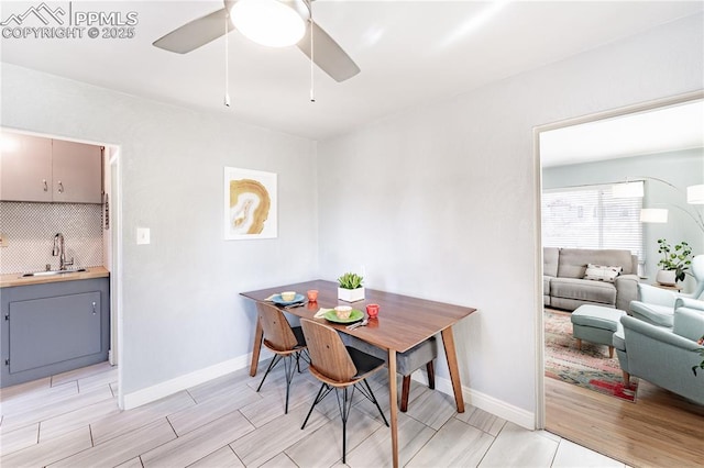 413 E Fontanero St, Colorado Springs, CO 80907 - dining room with baseboards, wood finish floors, and ceiling fan