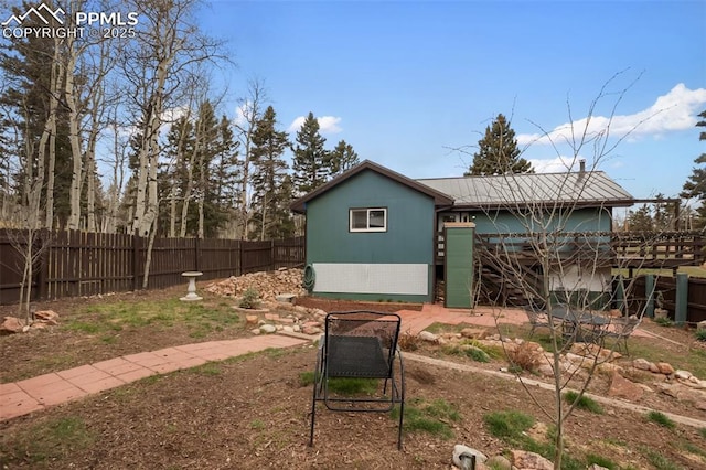 555 Elfin Glen Dr, Divide, CO 80814 - view of property exterior with fence and metal roof