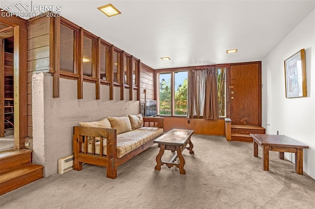 1455 La Mesa St, Colorado Springs, CO 80904 - living area featuring baseboard heating and light colored carpet