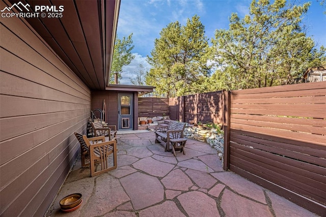 1455 La Mesa St, Colorado Springs, CO 80904 - fenced backyard featuring a patio area