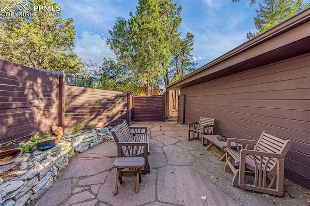 1455 La Mesa St, Colorado Springs, CO 80904 - fenced backyard featuring a patio