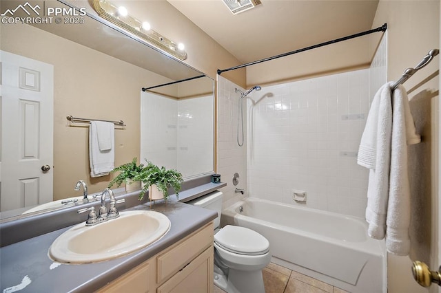 8545 Salsifa Ter, Colorado Springs, CO 80920 - full bath featuring toilet, vanity, shower / bath combination, and tile patterned floors
