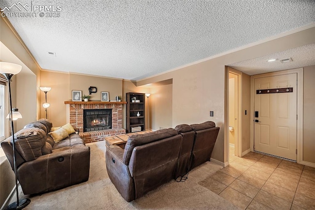 8545 Salsifa Ter, Colorado Springs, CO 80920 - living room with a textured ceiling, crown molding, a brick fireplace, and light tile patterned floors