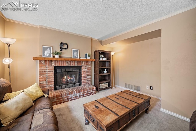8545 Salsifa Ter, Colorado Springs, CO 80920 - carpeted living room featuring a fireplace, a textured ceiling, ornamental molding, and baseboards