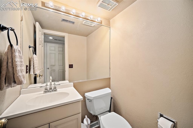 8545 Salsifa Ter, Colorado Springs, CO 80920 - half bathroom featuring toilet and vanity