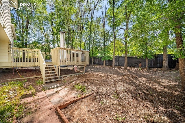 8545 Salsifa Ter, Colorado Springs, CO 80920 - fenced backyard featuring a deck and stairs