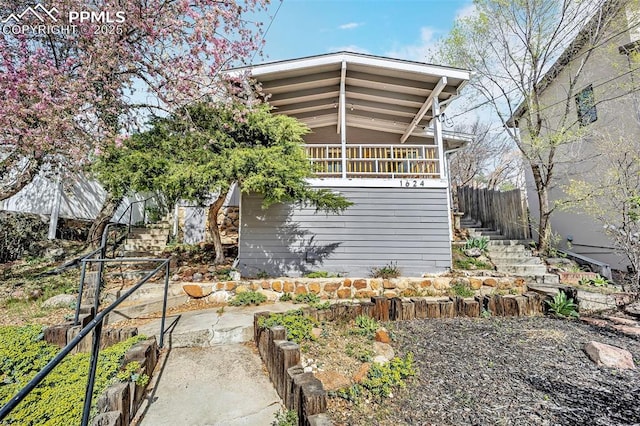 1624 Cheyenne Blvd, Colorado Springs, CO 80906 - view of home's exterior featuring stairway and a patio area