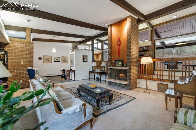 living area with carpet flooring, beam ceiling, a fireplace, brick wall, and a baseboard radiator