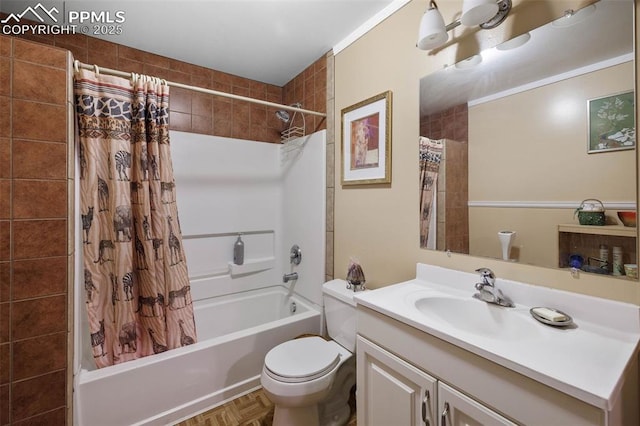 full bathroom with vanity, toilet, and shower / tub combo