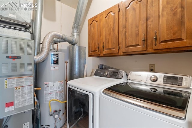 3109 Broadmoor Valley Rd Unit D, Colorado Springs, CO 80906 - washroom with gas water heater, washing machine and dryer, and cabinet space
