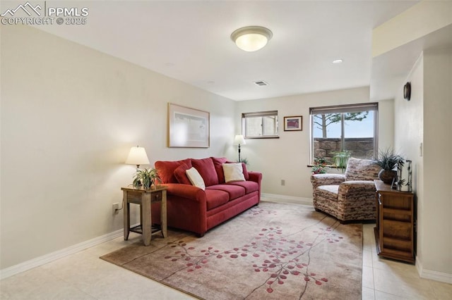 344 Mission Hill Way, Colorado Springs, CO 80921 - living room featuring tile patterned flooring, baseboards, and visible vents