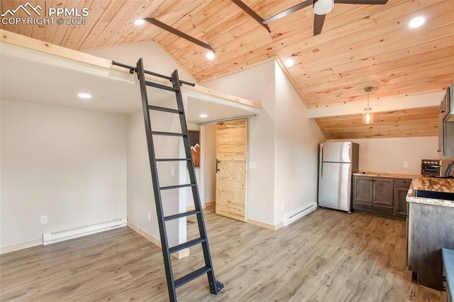 kitchen featuring freestanding refrigerator, wood ceiling, baseboard heating, and a barn door