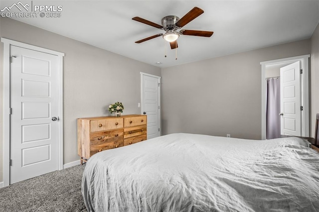 carpeted bedroom with ceiling fan and baseboards