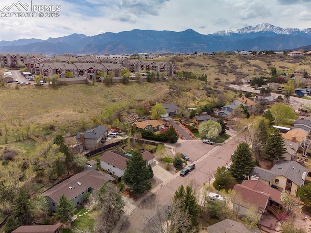 aerial view with a mountain view and a residential view