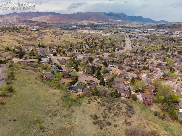 bird's eye view featuring a residential view and a mountain view