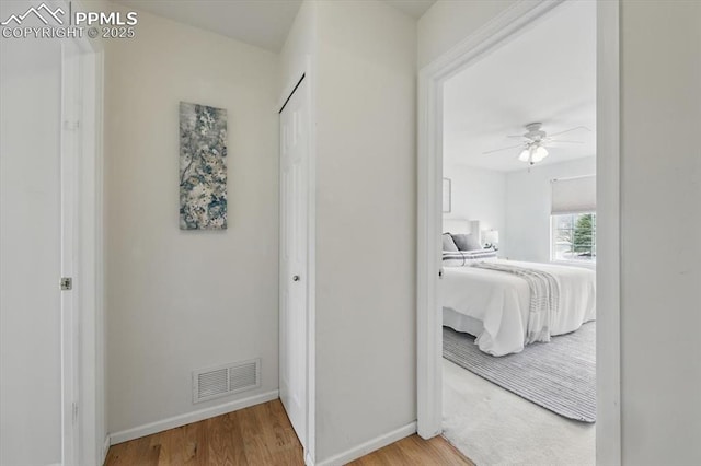 5012 Chaise Dr, Colorado Springs, CO 80923 - hallway featuring wood finished floors and baseboards