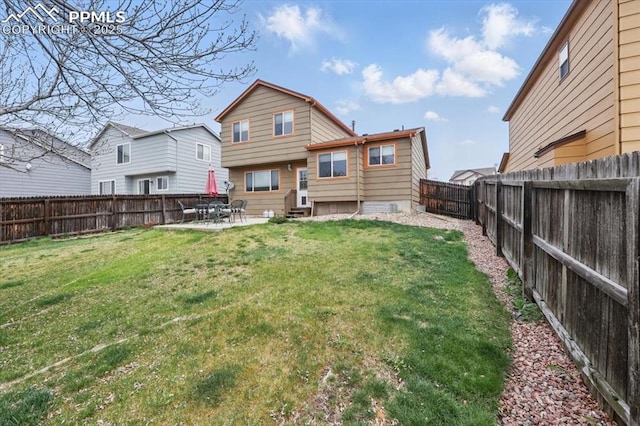 5012 Chaise Dr, Colorado Springs, CO 80923 - rear view of house with entry steps and a patio