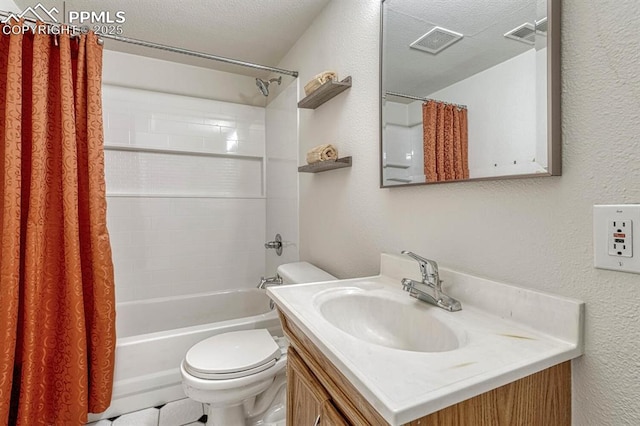 bathroom featuring vanity, shower / bath combination with curtain, toilet, visible vents, and a textured wall