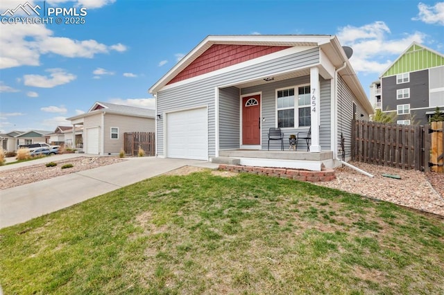ranch-style house featuring fence, an attached garage, a porch, a front yard, and concrete driveway
